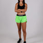 Full body shot of the ChicknLegs women's neon green split running shorts.