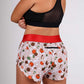 ChicknLegs women's 1.5" pasta night split running shorts rear view.