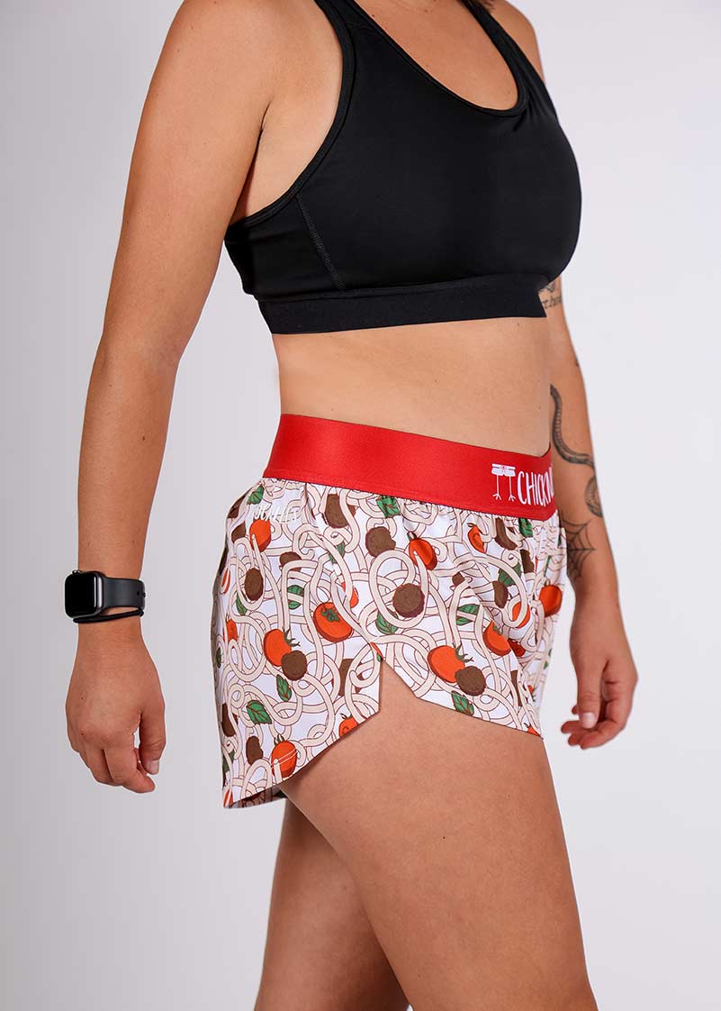 ChicknLegs women's 1.5" pasta night split running shorts side closeup view.