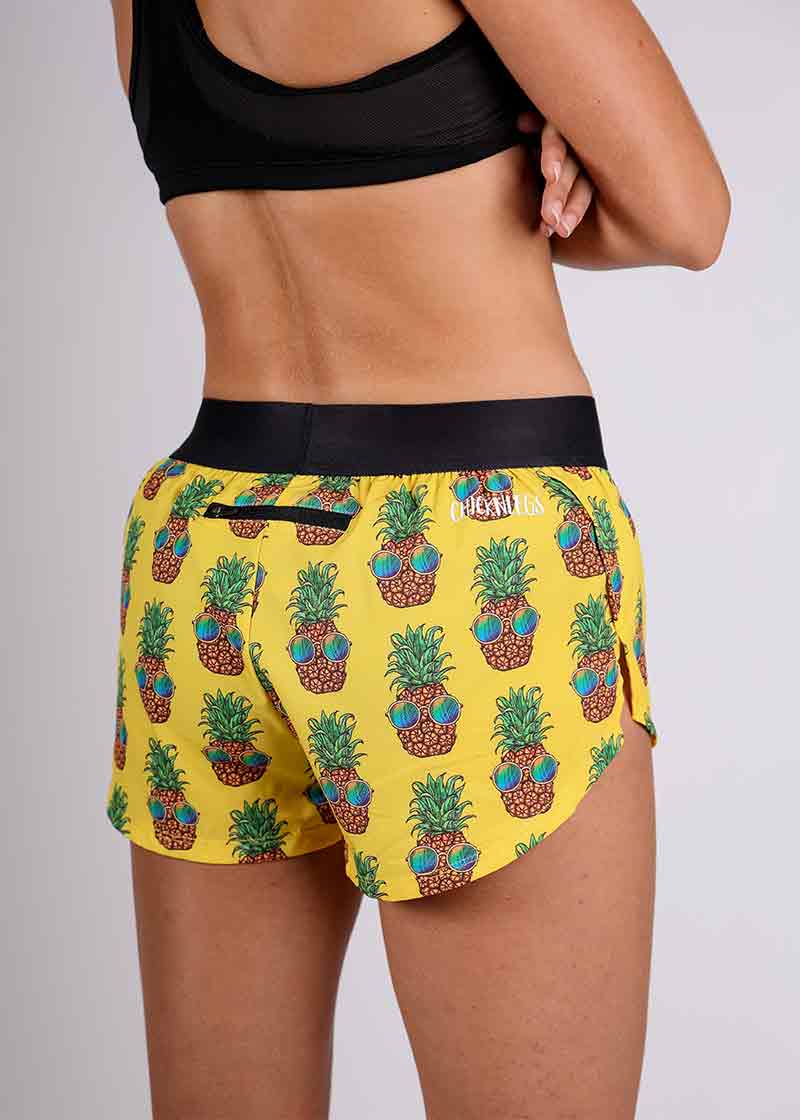 Rear closeup view of the ChicknLegs pineapple express 1.5 inch split running shorts.