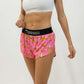 Front closeup view of the women's pink bananas split running shorts from ChicknLegs.