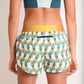 ChicknLegs women's trippy pineapples 1.5" split running shorts rear view.