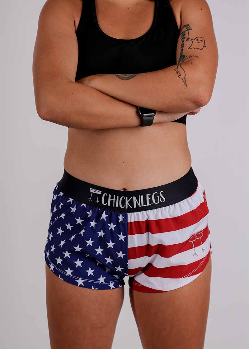 Front closeup view of the ChicknLegs women's USA split running shorts.