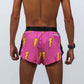 Rear closeup view of the men's 2 inch hot pink bolts running shorts.