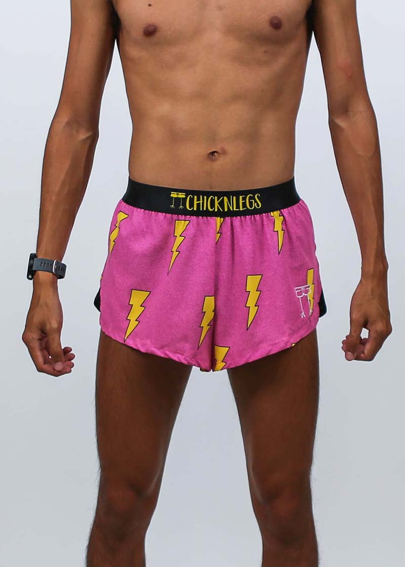 front closeup view of the men's 2 inch hot pink bolts running shorts.