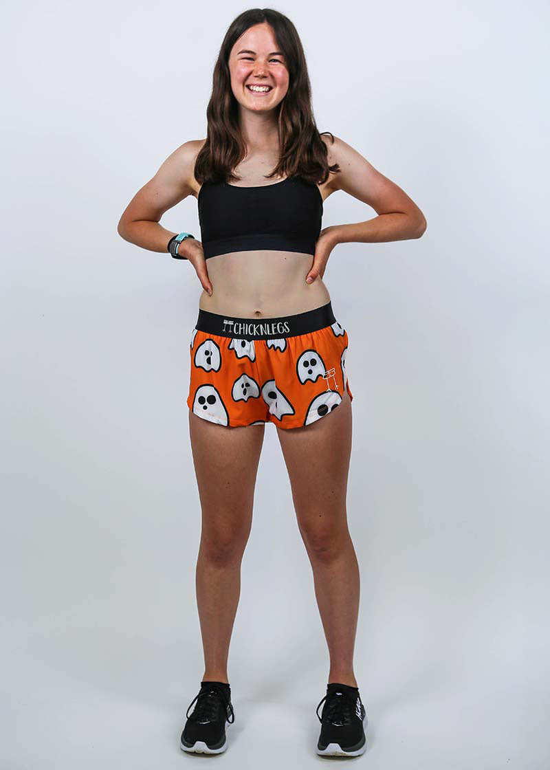 Full body view of the women's ghosts 1.5 inch split running shorts.