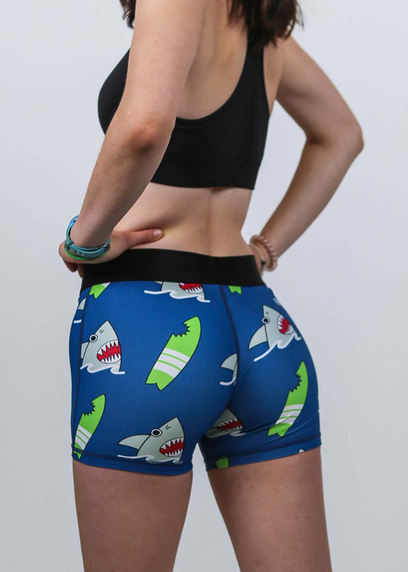 Closeup rear view of the women's 3 inch blue sharks compression shorts.