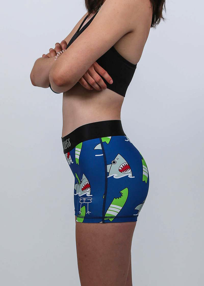 Closeup side view of the women's 3 inch blue sharks compression shorts.
